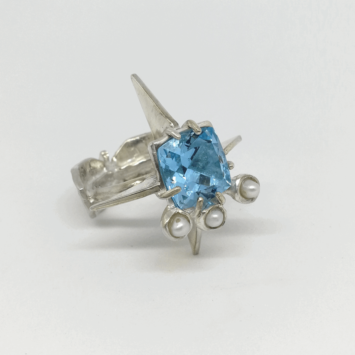 Shop one of a kind custom sterling silver blue topaz and freshwater pearls women's ring The Bellatrix from the Malki Studio unique jewellery collection. They will ship to you from Australia.