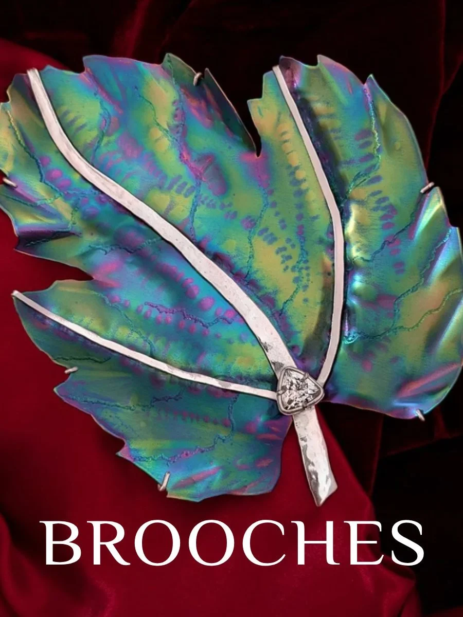 Shop unique large brooches handmade from from responsibly sourced precious metals, colourful titanium and unique gemstones.