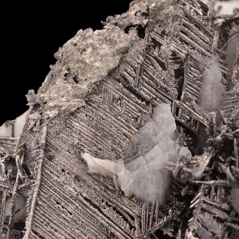 Native silver specimen with "Herringbone"-style crystals forming "fan" or "sail" shapes with off-white colored Calcite on matrix.