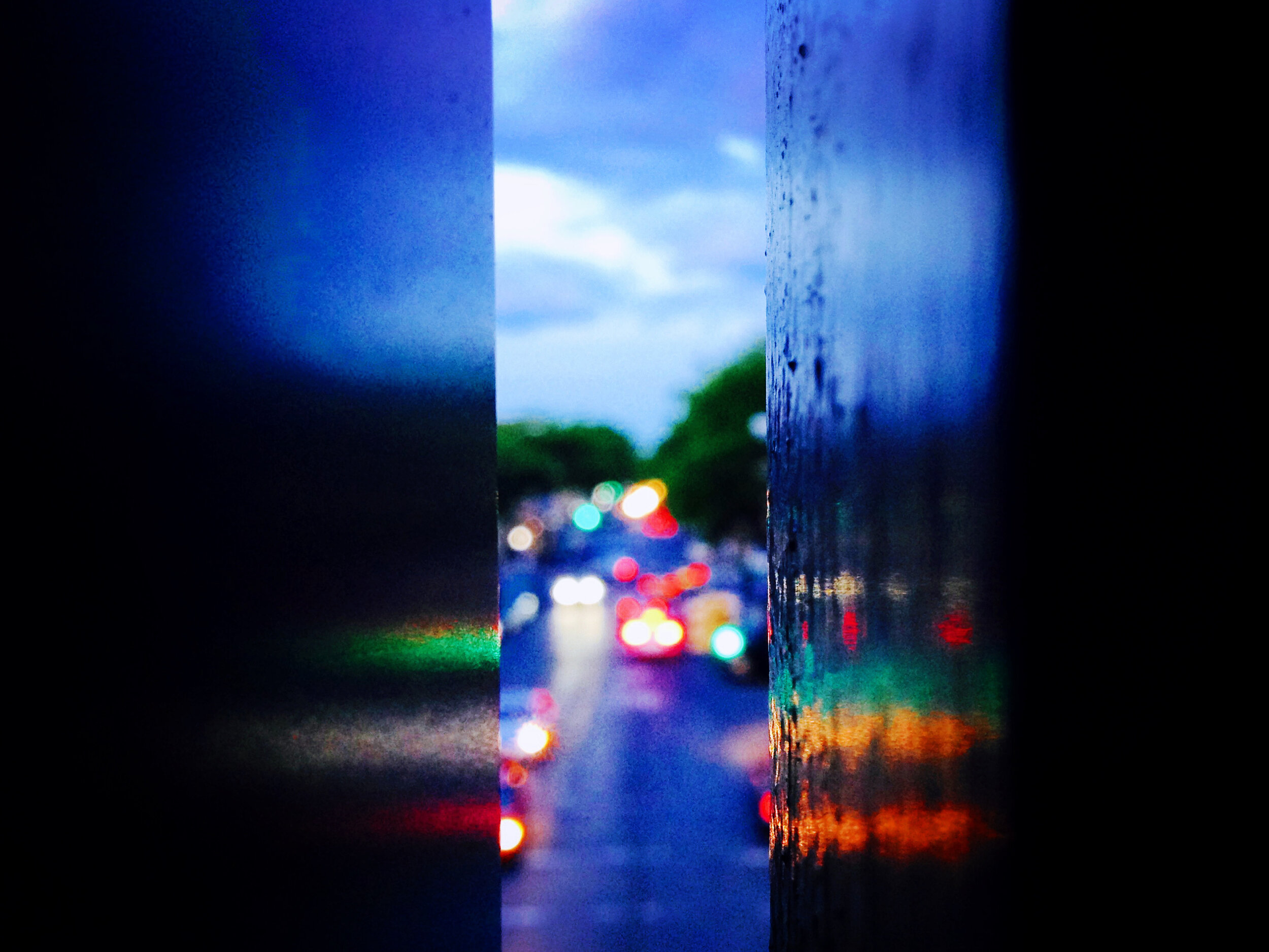 BROOKLYN, NY - MAY 25, 2014: Avenue U, from between panels of a subway station’s exterior wall.