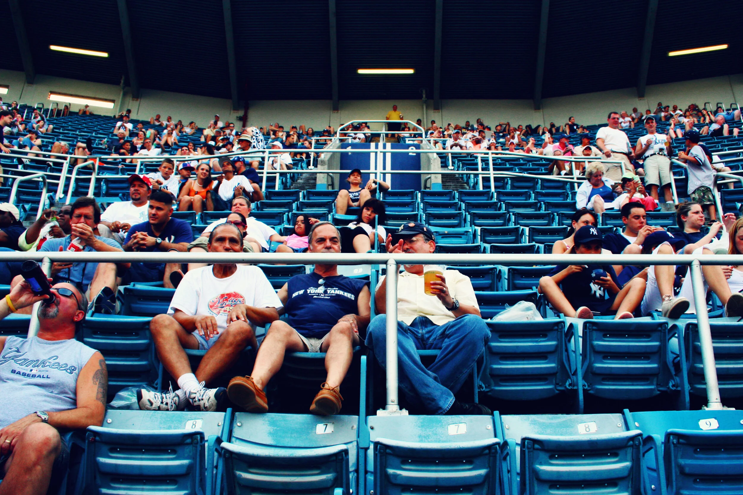 BRONX, NY - AUGUST 2, 2006: Fans in the upper deck of Yankee Stadium behind home plate as they await the first pitch of Toronto Blue Jays vs. New York Yankees.