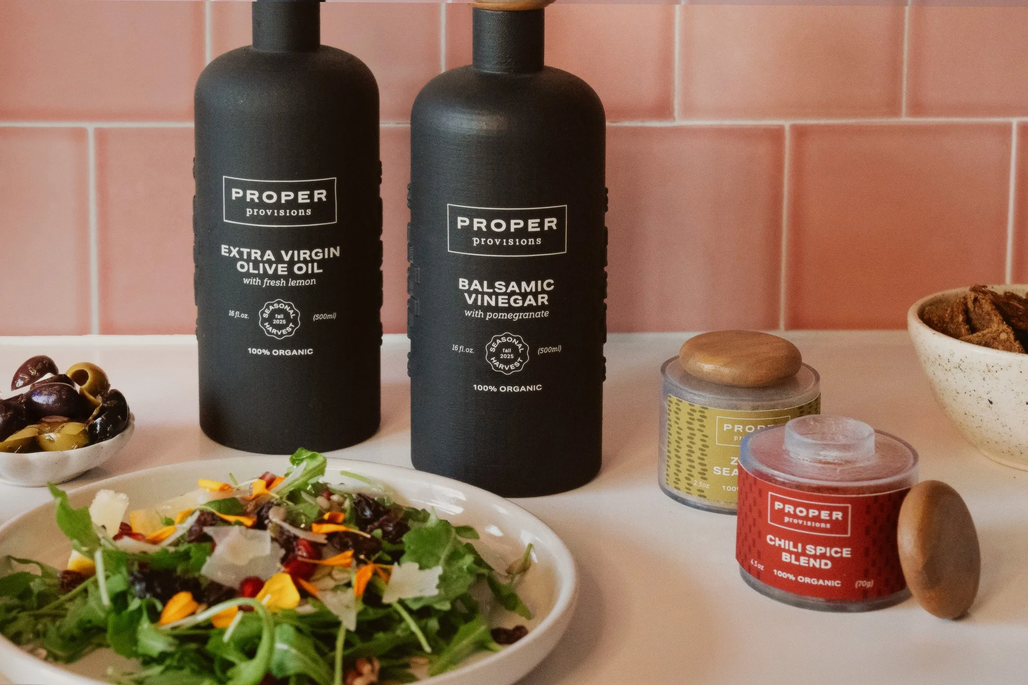 CaressHailey_KimHaily_ProperProvisions_PackDesign3_FA2021_pink bg 2-2.jpg