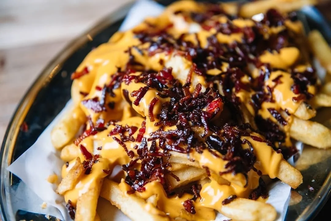 Every hero needs their side kick🦸🏼&zwj;♂️🍗 ! 
​
​What better complement then succulent flavoursome tenders coupled with tasty bacon loaded fries!You can also swap these baddies out for a side of vegetarian cauliflower wings, mash or even mouth-wat