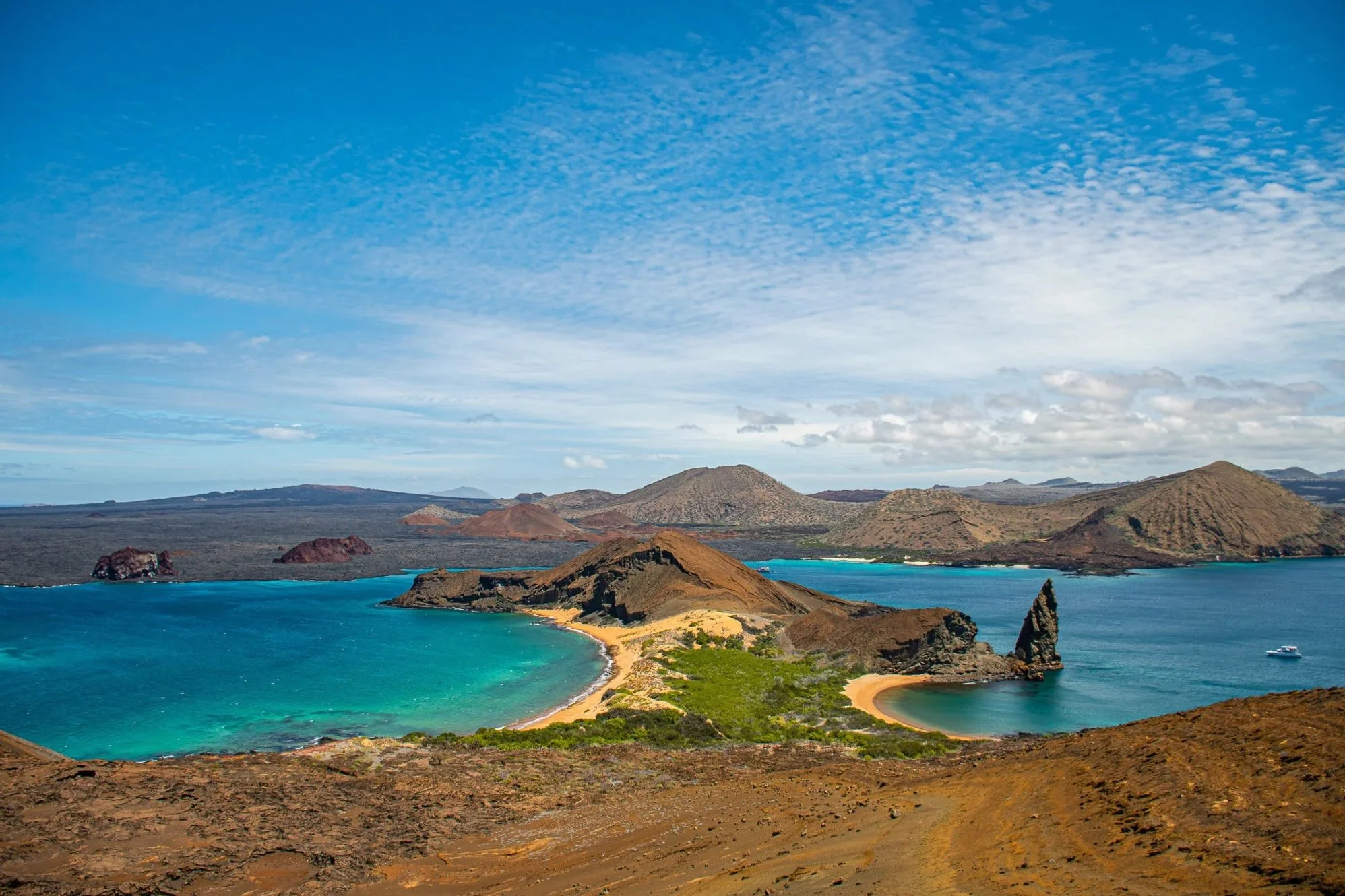 Image of Bartolome Island and the blue ocean surrounding both sides of the peninsula.