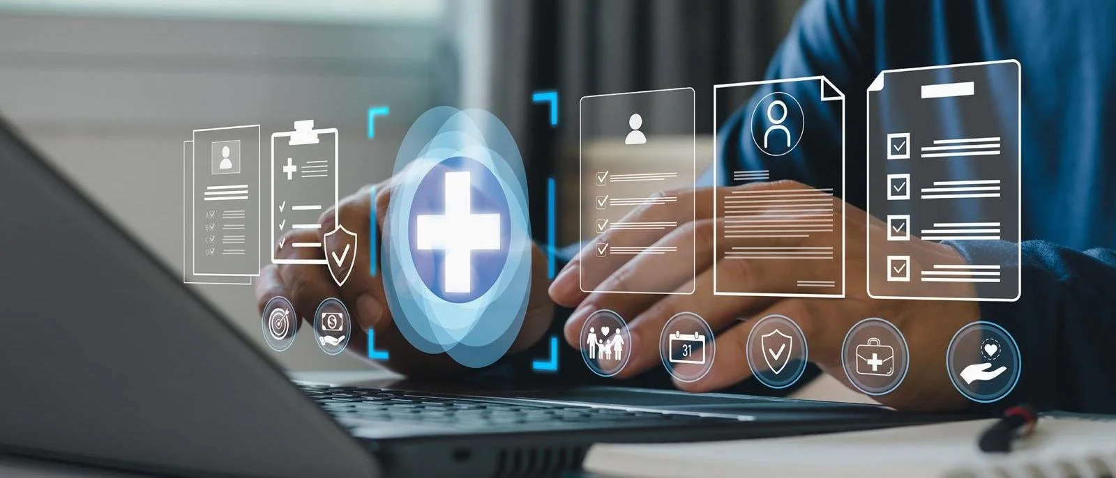 Health care team member at computer answering messages