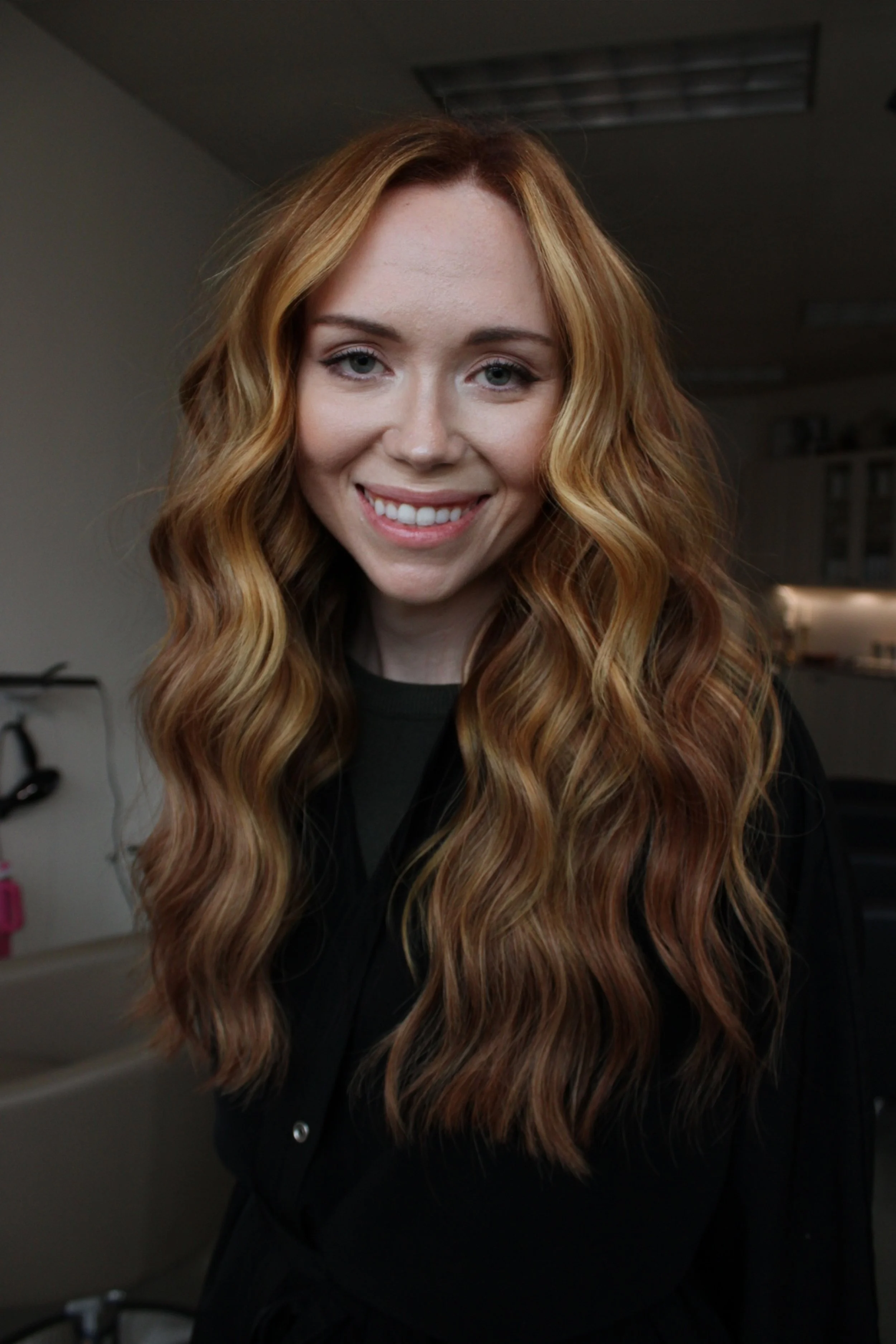 Redhead copper hand tied weft extension install at Elle Society Salon, West Linn Oregon