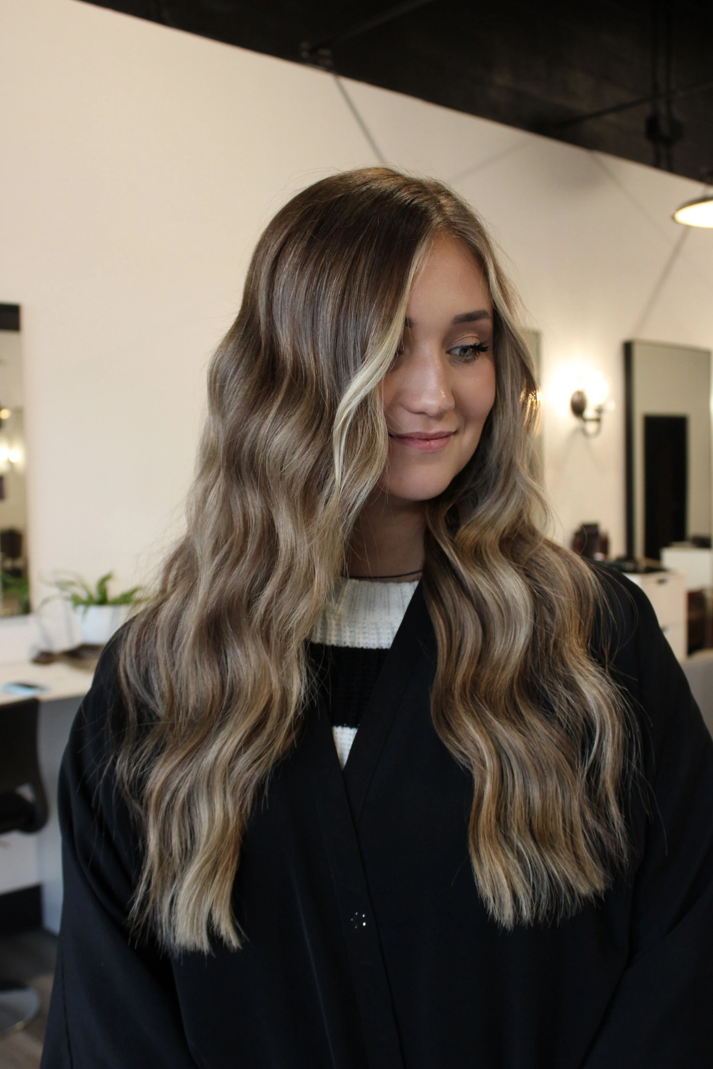 Dimensional balayage with custom extensions for seamless blending