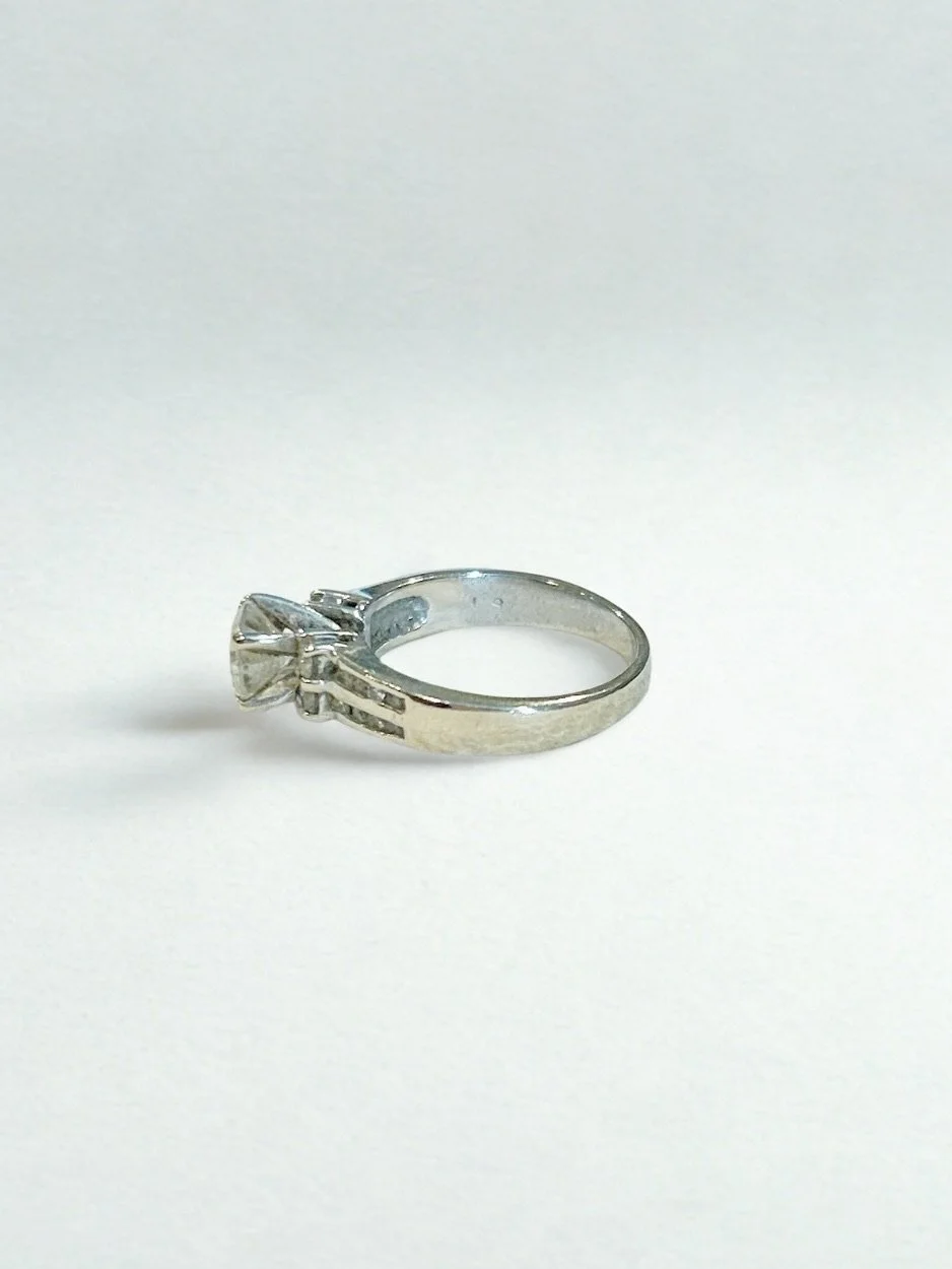 Side view of Zahava ring showing white gold split shank and pavé detailing