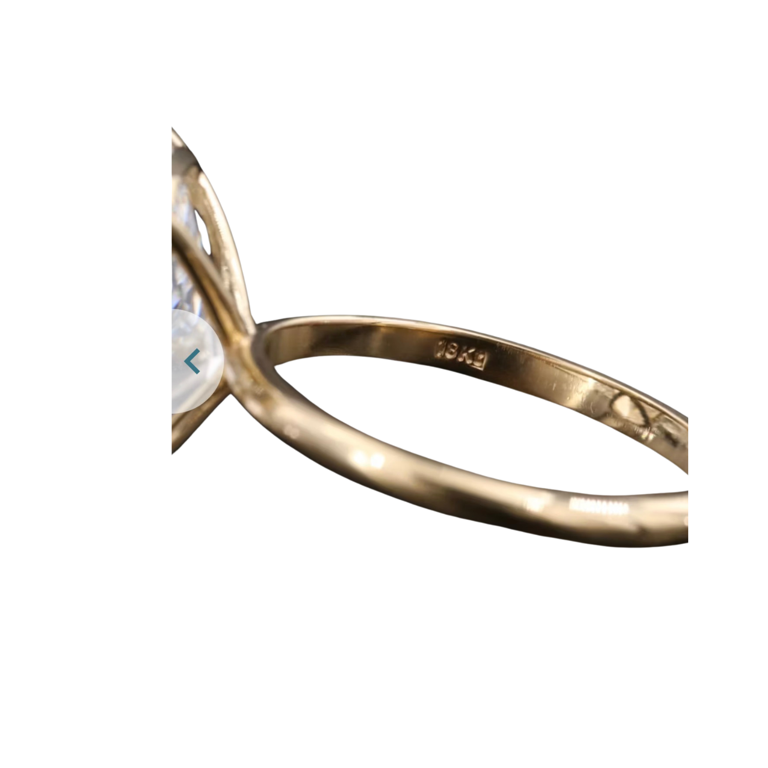 side view of gold lab diamond engagement ring.png