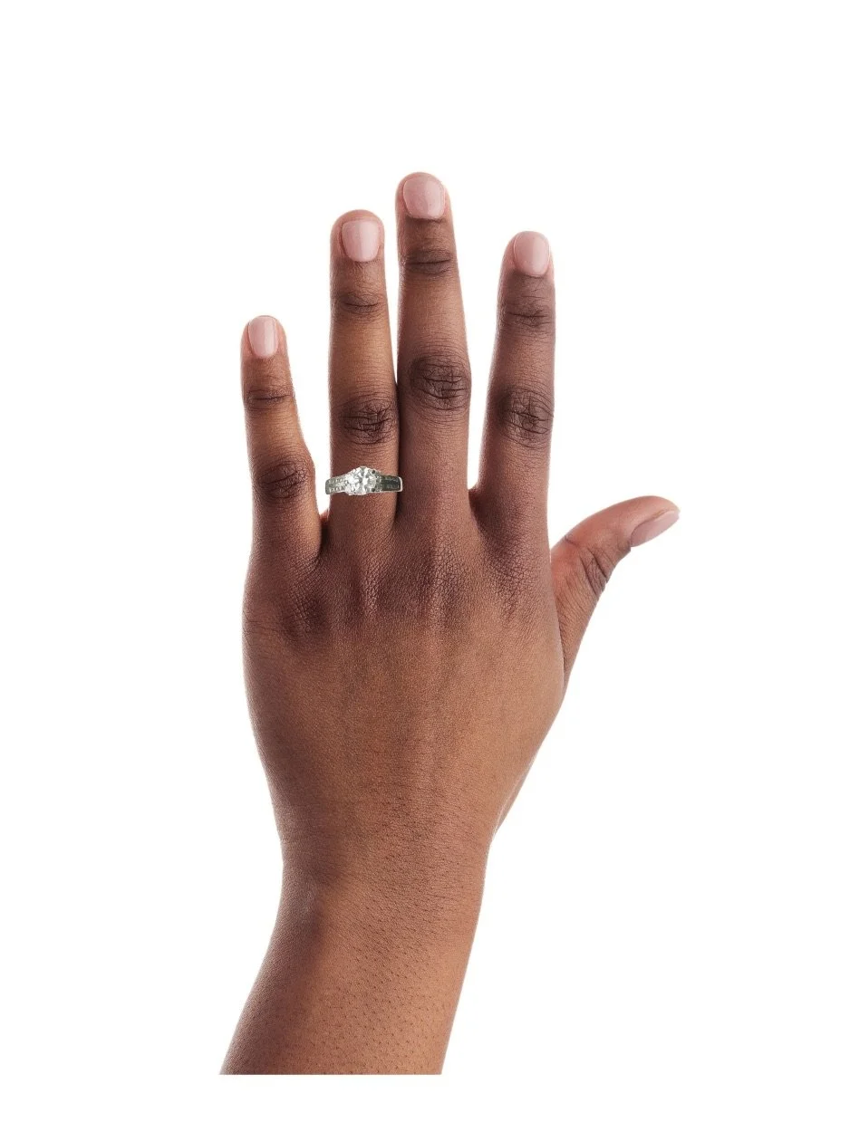 Zahava round diamond ring worn on finger, showing sparkle and finger coverage