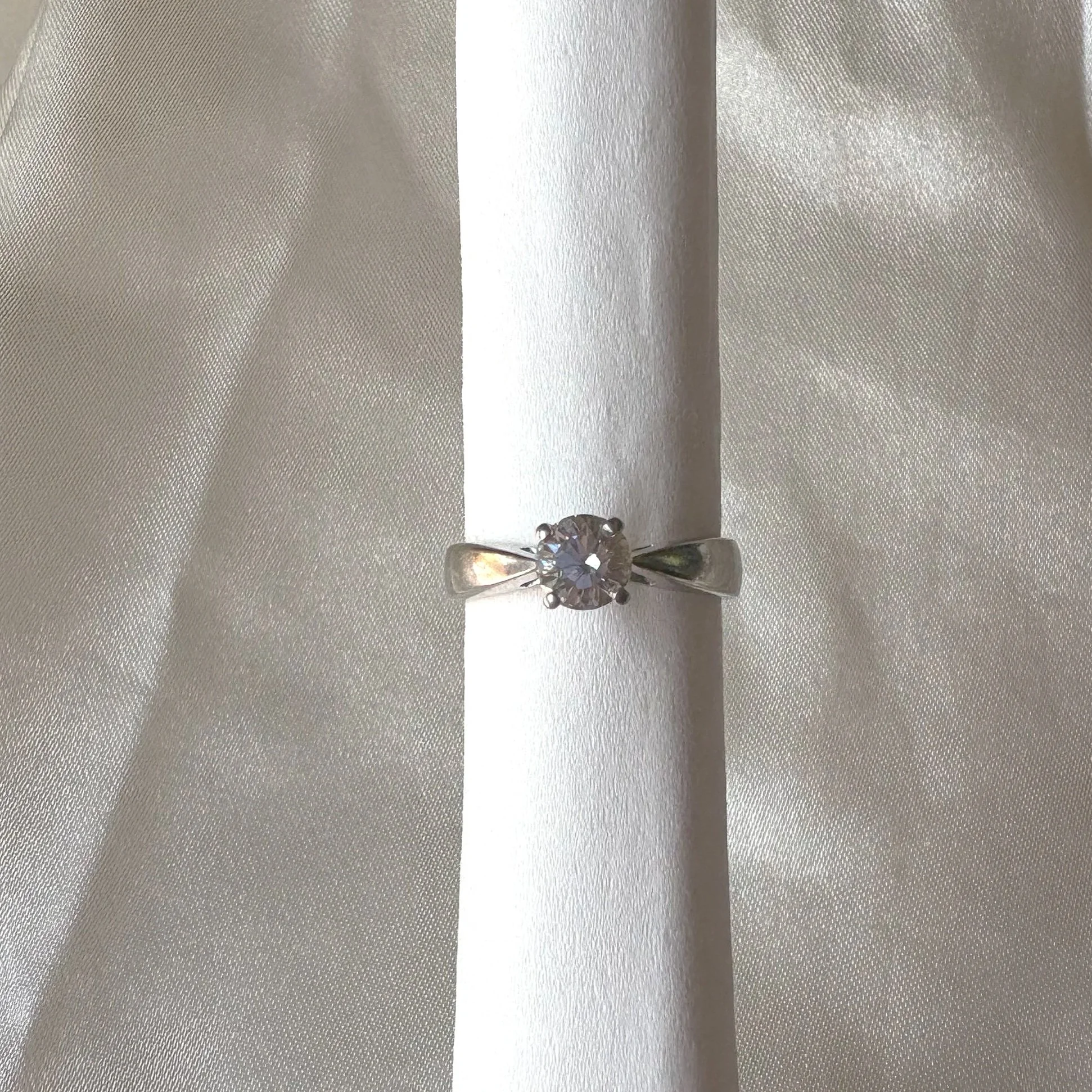 straight view of 0.73 carat Canadian brilliant round solitaire