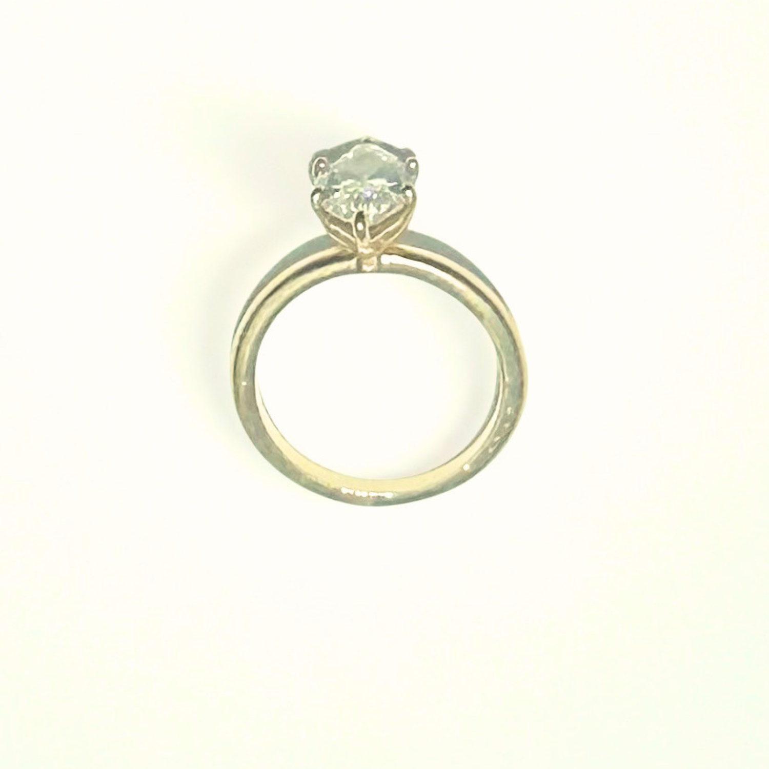 Overhead view of previously owned marquise lab diamond engagement ring