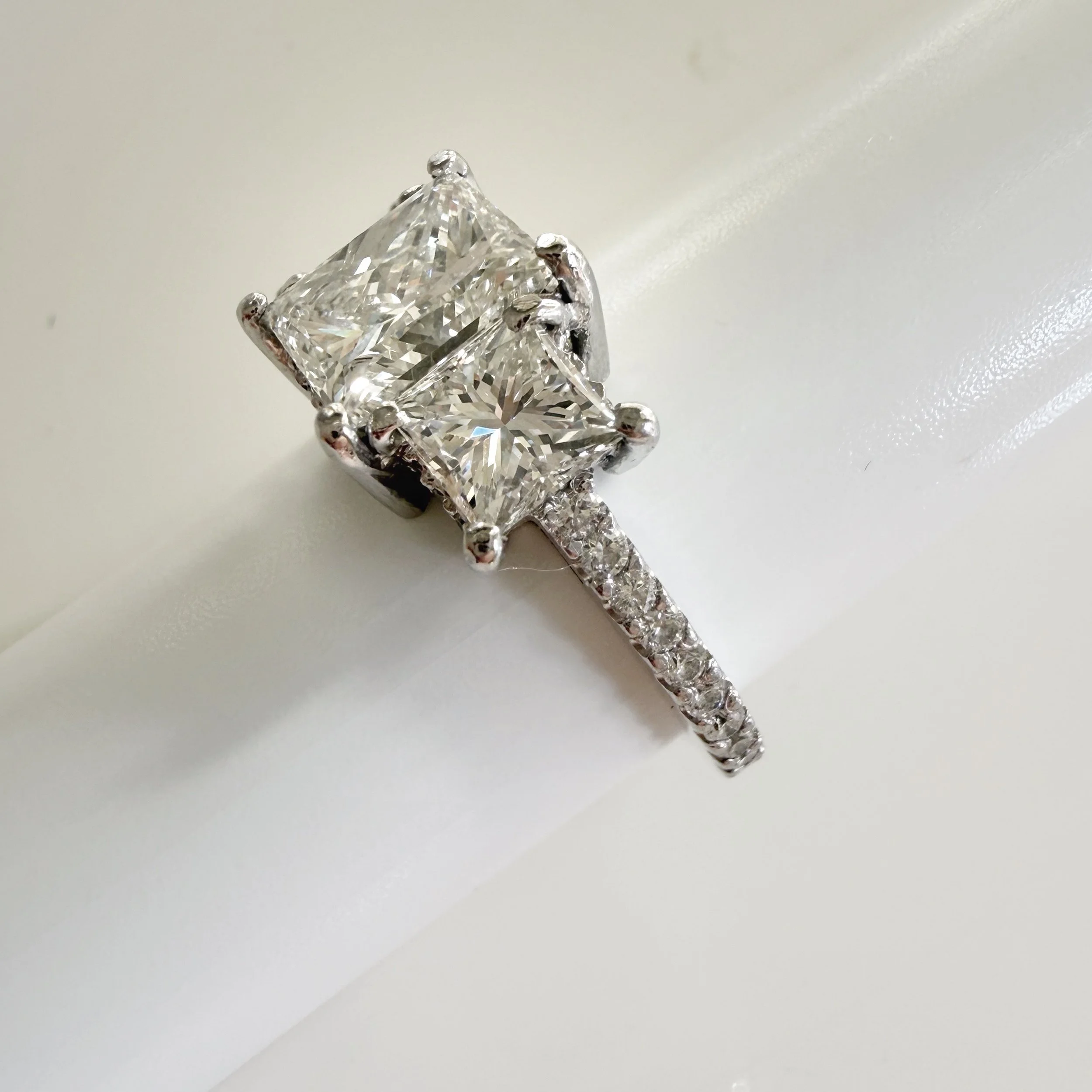 Preloved diamond engagement ring, 1.98 carats, three stones, princess cut