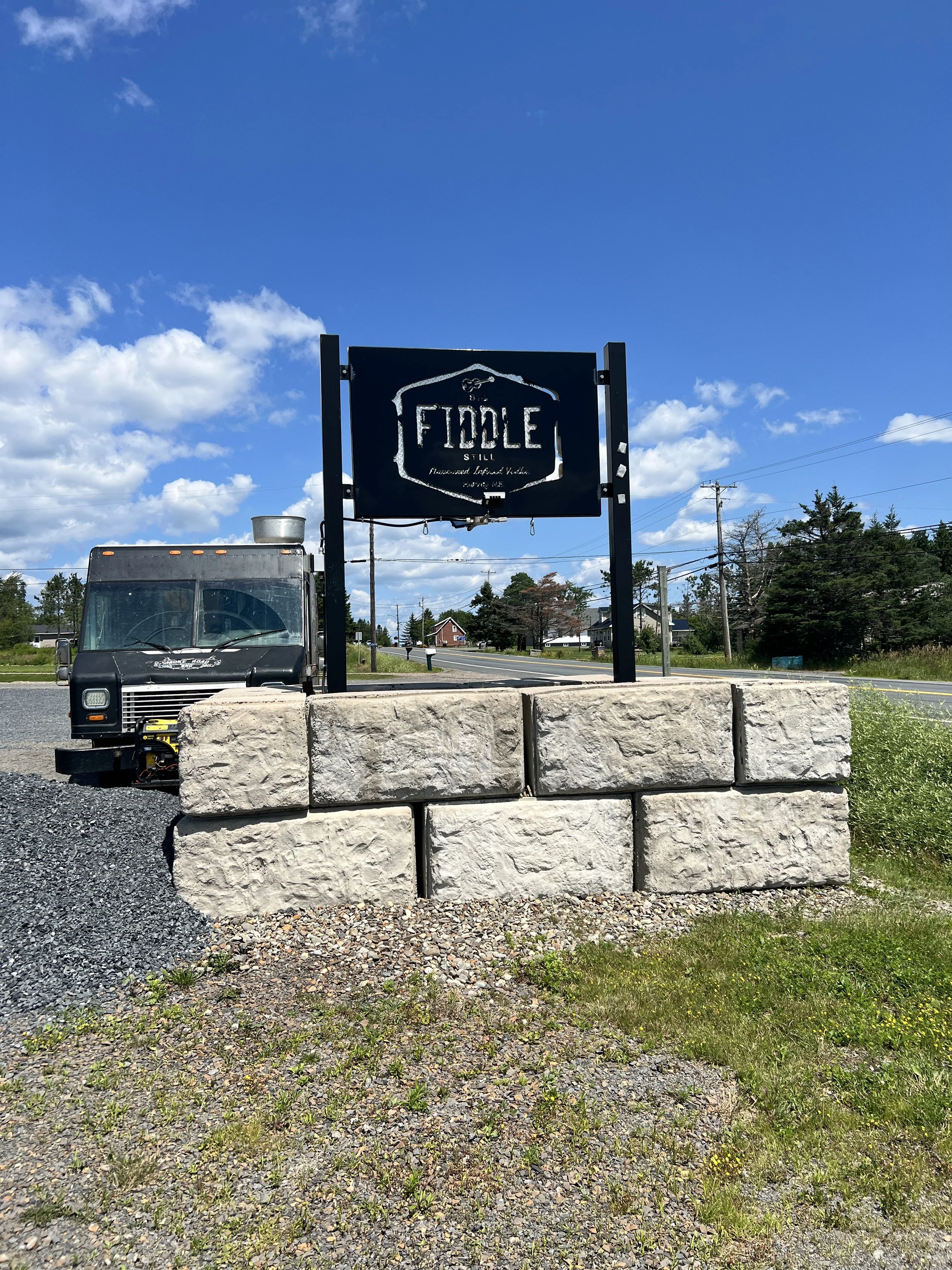 Big Fiddle Still Sign & Food Truck.jpeg