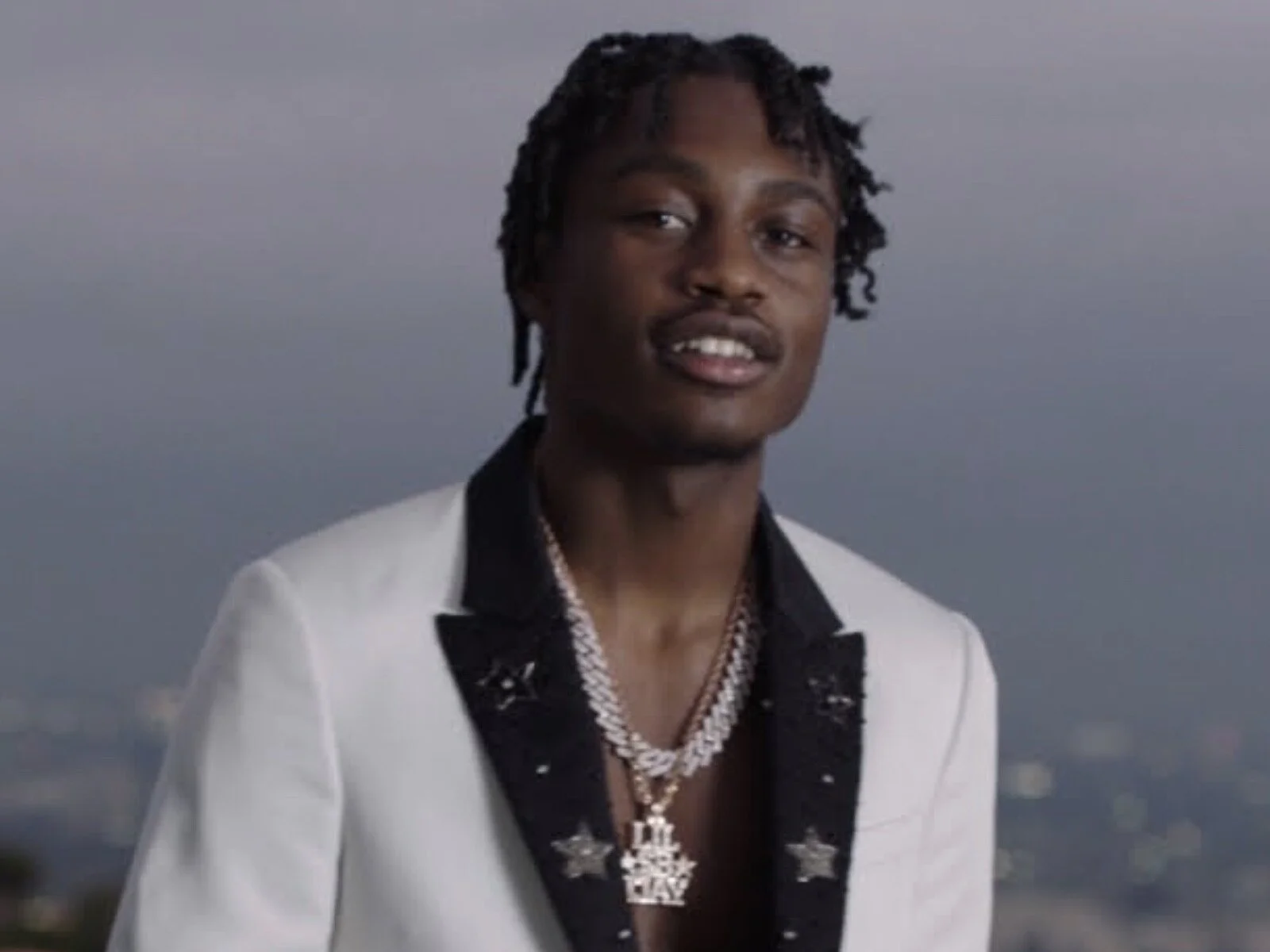 Lil Tjay Goes Gangster To Hype Up New Music