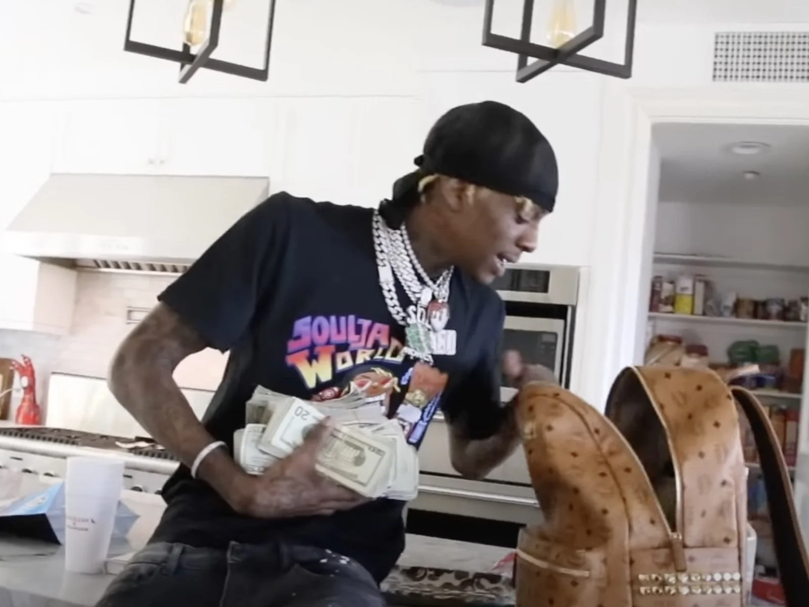Soulja Boy could build a mini-castle with his money stacks
