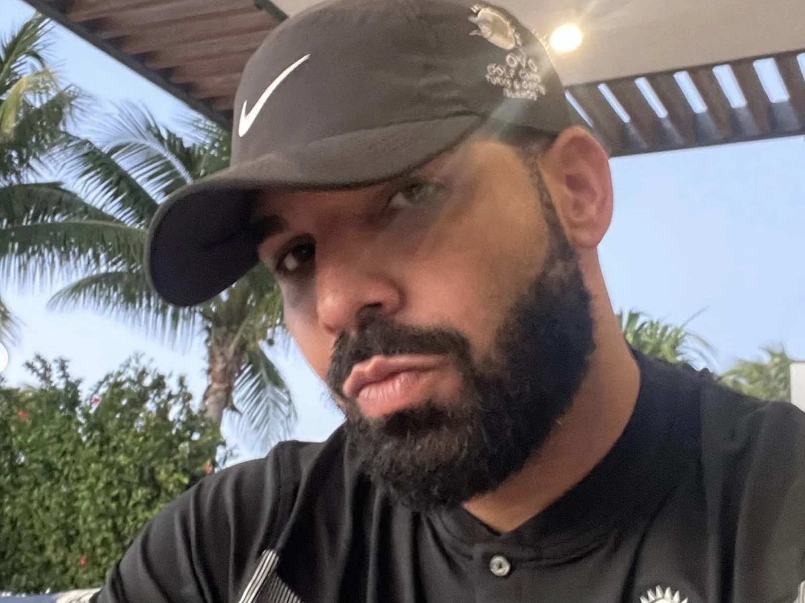 Drake's matching his ex's bikini thirst trap with his own beach flex