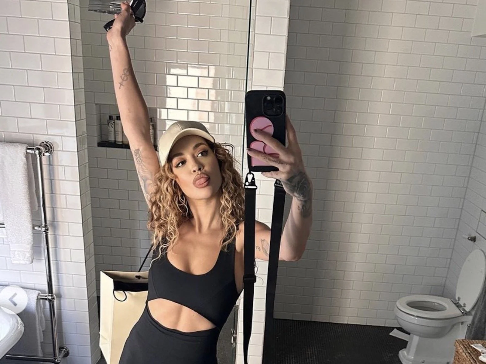 Rita Ora: The bathroom flex is alive and well all the way from Germany