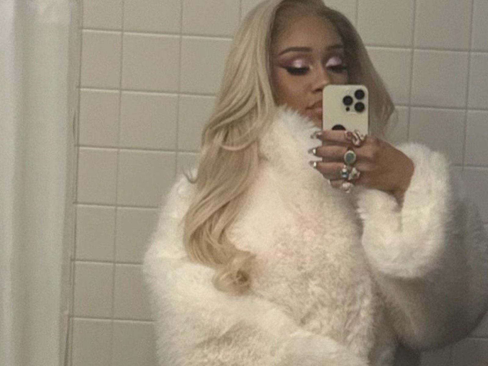Saweetie: It's all in the fur coat and fire sneaker flexing for me