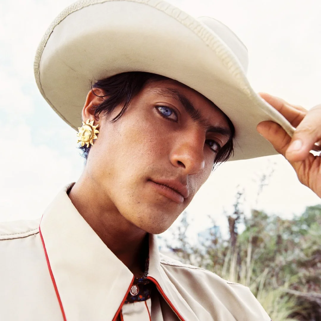 Man in White Ranchero Hat.jpg