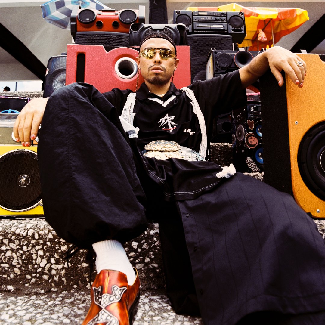 Man Posing in Front of Jukeboxes.jpg