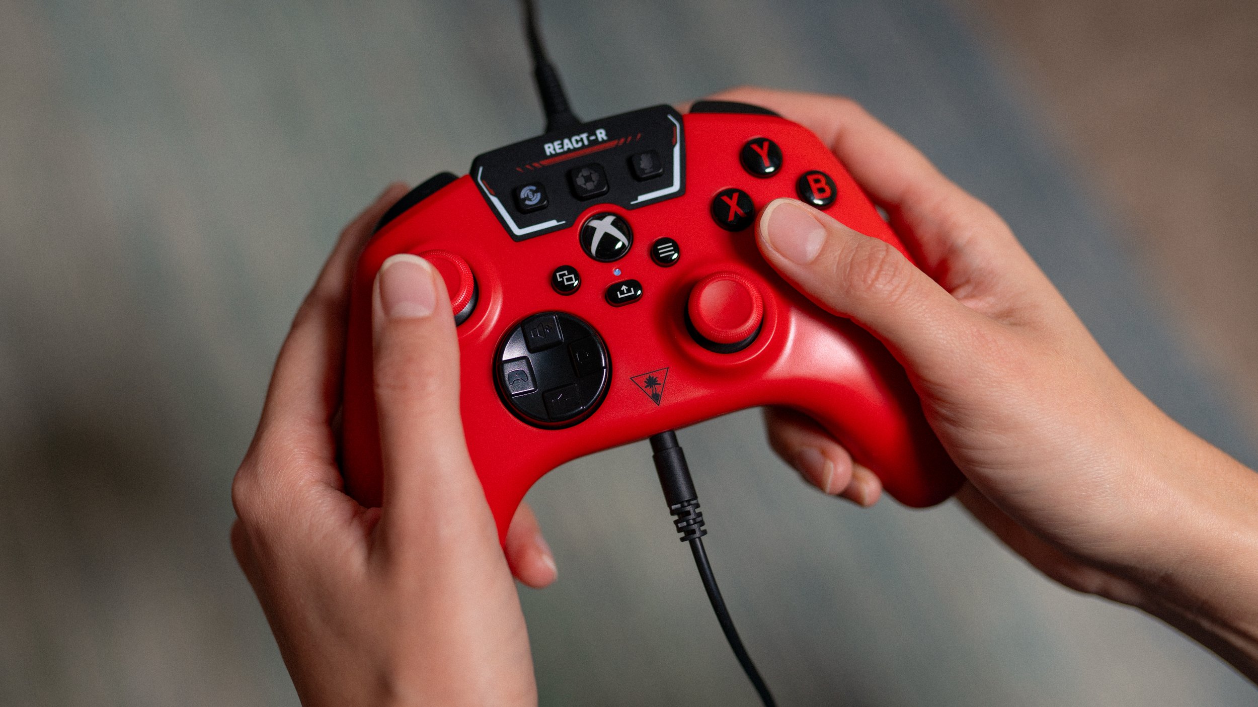 Turtle-Beach-REACT-R-Red-Controller-Lifestyle-Photo-1.jpg