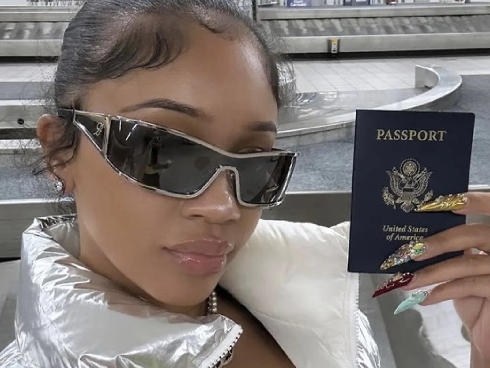 Saweetie: It's an international flex with the passport book to prove it
