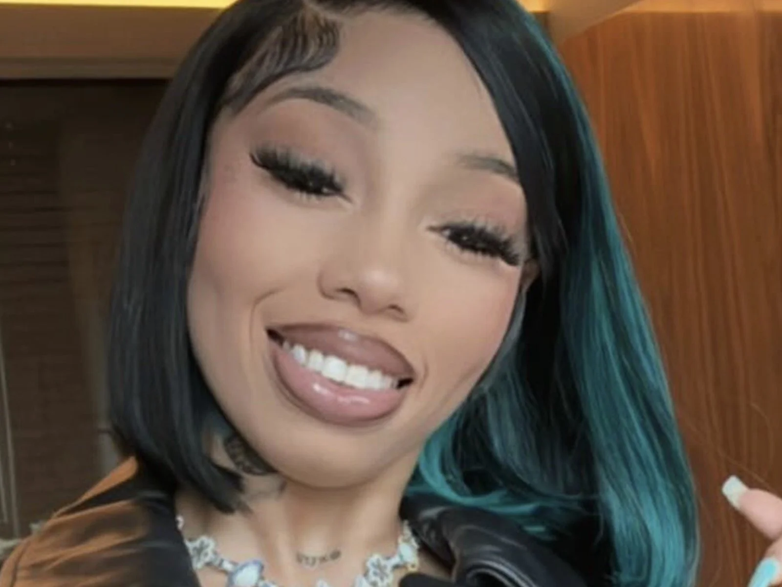 Anycia: The jaw-dropping rap diva has picture perfect smile features