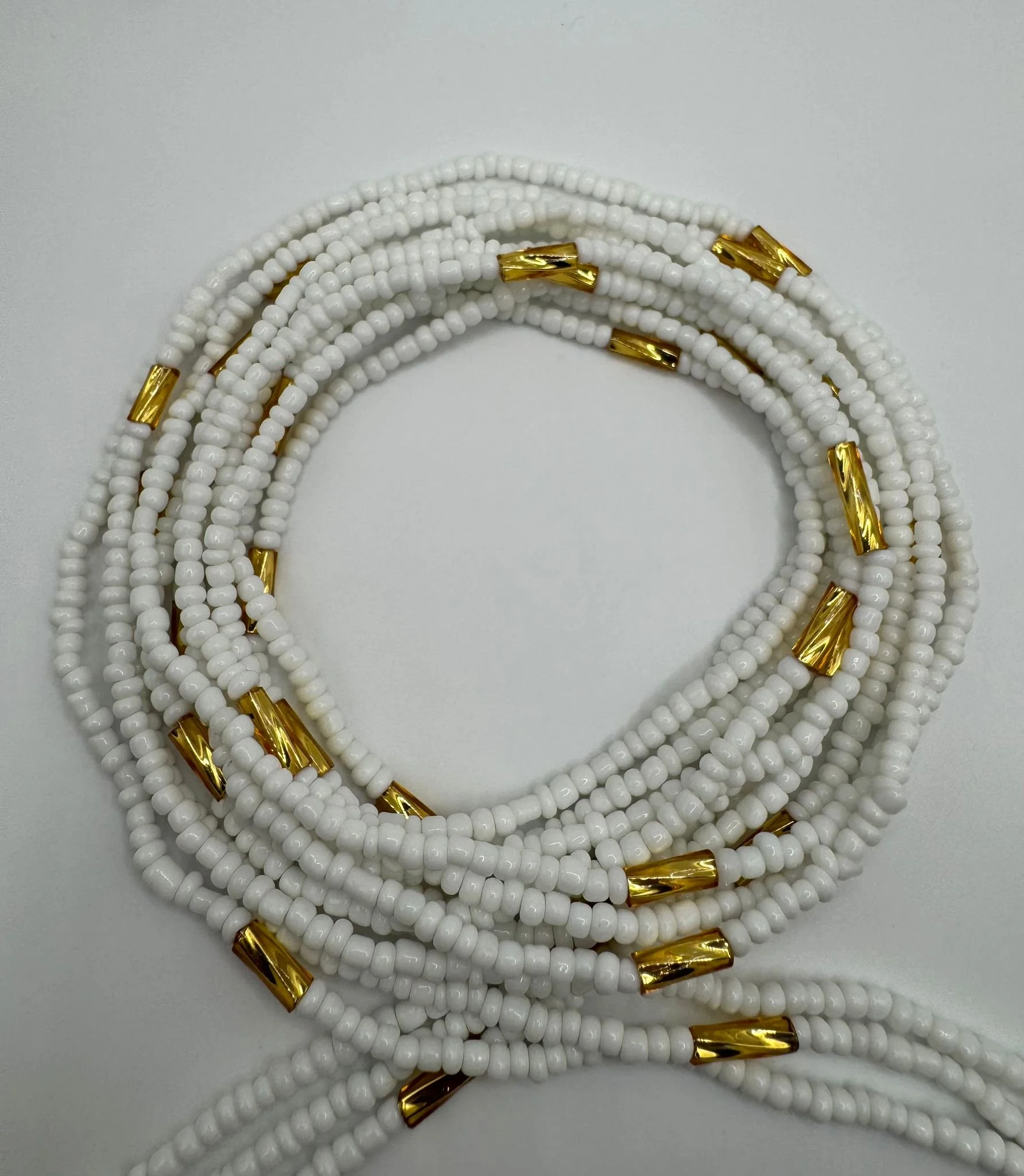 White and Gold Twisted Bugle Waist Beads.jpg