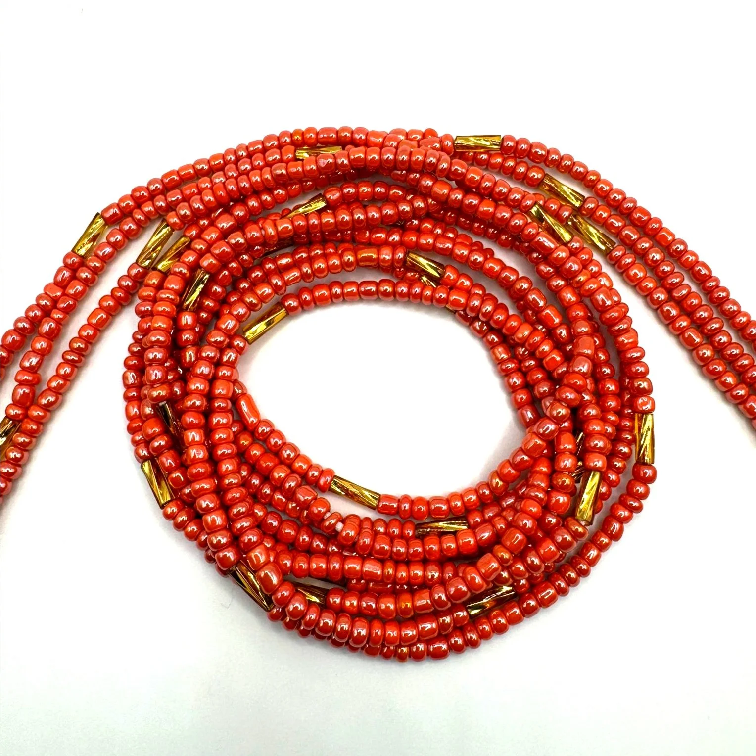 Peach and Gold Twisted Bugle Waist Beads.jpg