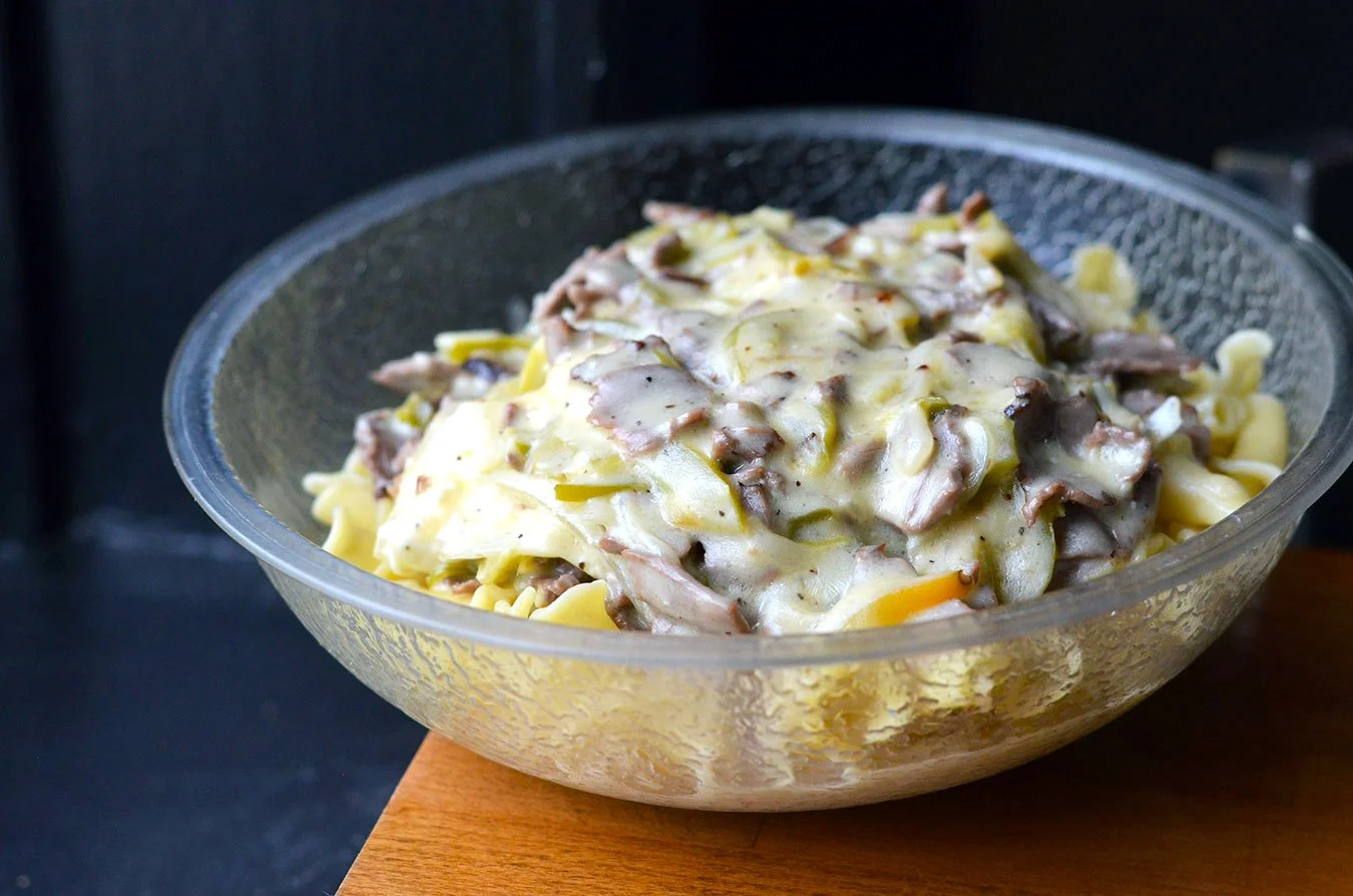 PHILLY MAC: Our original mac &amp; cheese with roast beef, cream cheese, and sauteed onions &amp; green peppers. Full menu: LINK IN BIO