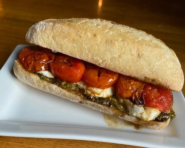 Don't miss the Eat Crow WEEKLY SPECIAL &bull;🍅 Roasted Tomato Sandwich 🥪: Roasted tomatoes with sliced mozzarella, pesto, and a balsamic glaze on a hoagie roll 🌿VEGETARIAN!🌿 - $19 comes with a side. Available through January 11th.