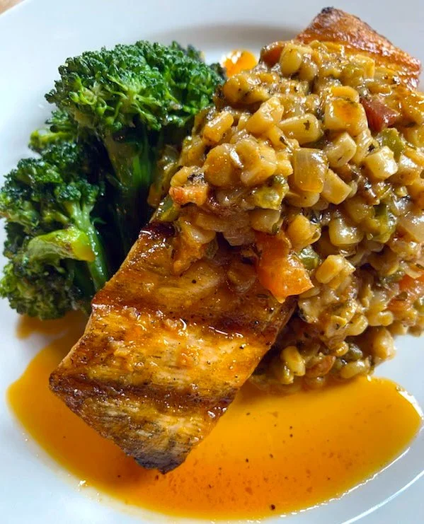 Eat Crow WEEKLY SPECIAL &bull;🐟 Cajun Salmon 🔥: Salmon filet on a bed of creole cream corn garnish- bacon, green pepper, onions, tomatoes, with Cajun butter and broccolini- $22. Available February 2nd-8th.