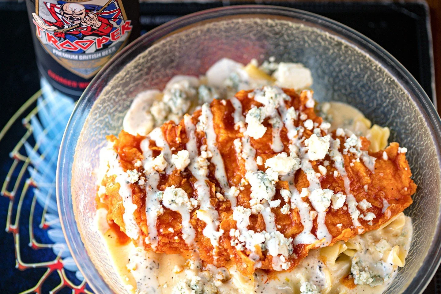 We're open for Lunch and dinner! HOT HONEY MAC: Our original mac and cheese with fried hot honey chicken, gorgonzola, and a drizzle of ranch!
