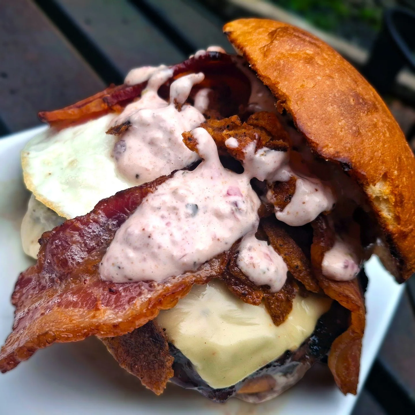 THIS WEEK ONLY! The Eat Crow WEEKLY SPECIAL &bull; ☀️ Good Morning Burger 🍔: A half-pound beef patty topped with green chile mayo, an over-easy egg, pepper jack cheese, fried onions, and bacon, all served on a brioche bun - $19, includes a choice of