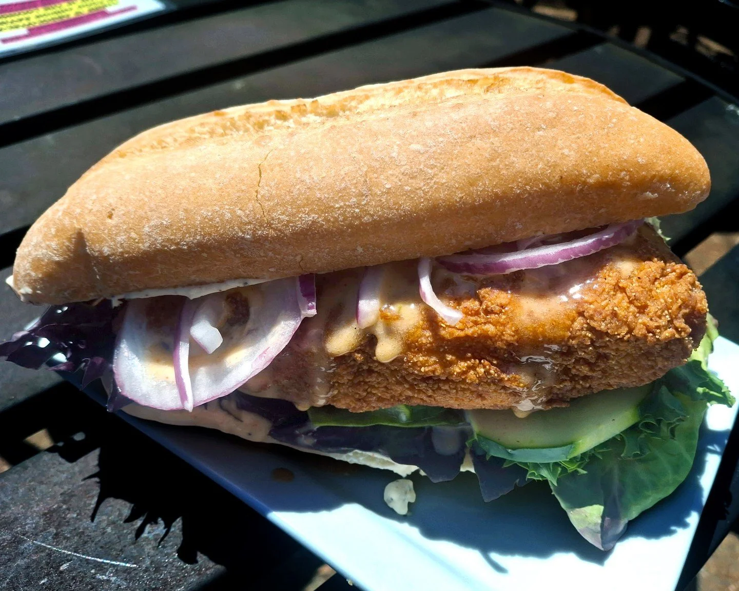 Eat Crow WEEKLY SPECIAL &bull; 🐟 Fired Salmon Sando 🎣: enjoy a cornmeal and flour-breaded fried salmon fillet, paired with zesty cream cheese, mixed greens, cucumber, remoulade, and red onions, all served on a hoagie bun - $19, includes a choice of