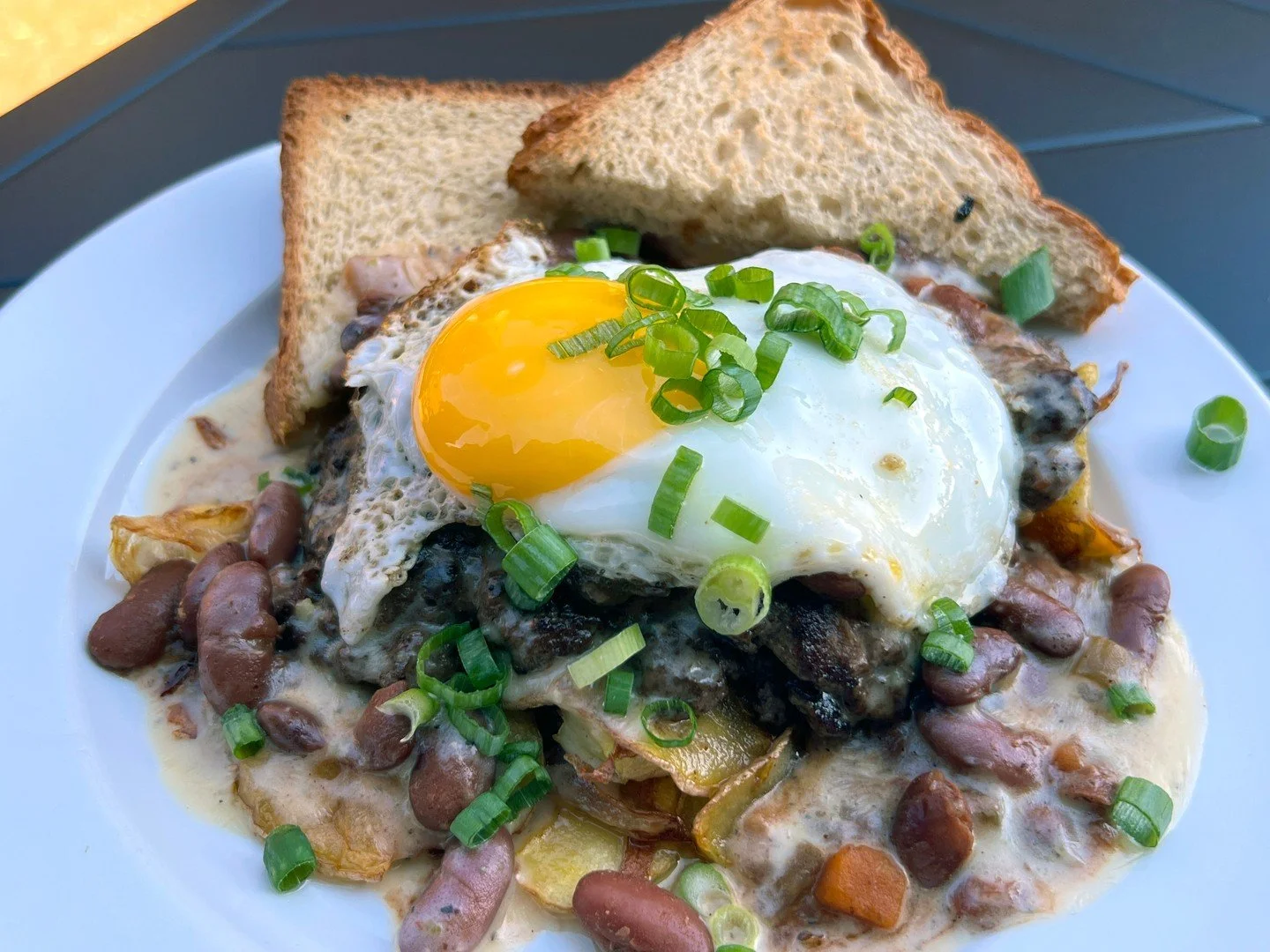 Join us for Saturday Metal Brunch from 11 AM to 2 PM! 

Try our Veggie Slinger: a grilled Hungry Planet veggie patty served on a bed of breakfast potatoes, smothered in meatless chili. It's topped with Gouda jalape&ntilde;o cheese sauce and a sunny-s