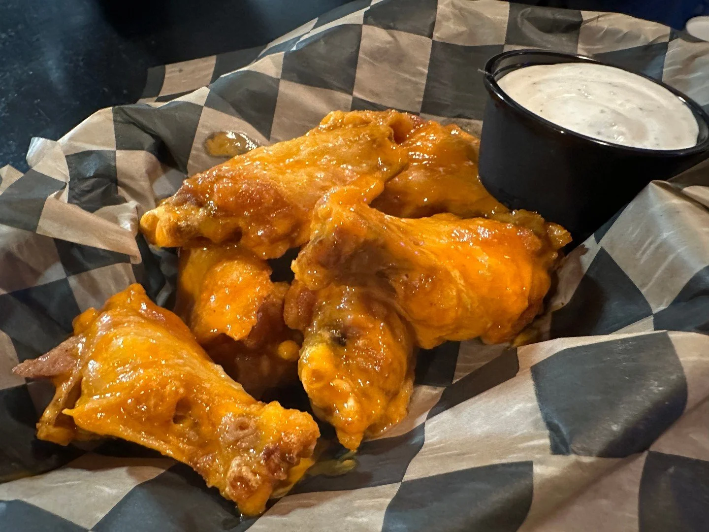 Indulge in our delicious chicken wings available in four mouthwatering flavors: Classic Buffalo, Hot Honey, Honey Mustard, and BBQ!