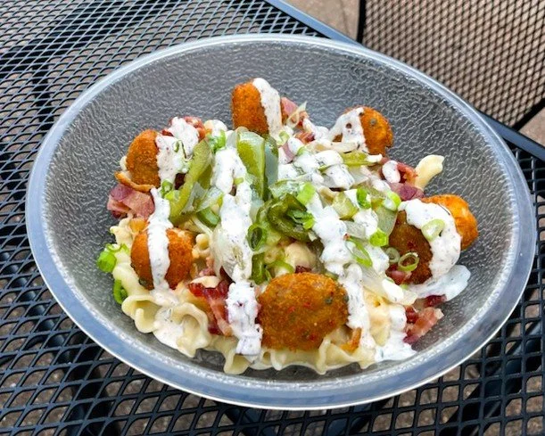**EAT CROW WEEKLY SPECIAL!** 
🌶️ Popper Mac 🧀 - Jalape&ntilde;o poppers sit atop our campanelle mac and cheese, with bacon, green peppers, and onions, all drizzled with jalape&ntilde;o ranch.

This special is available from August 31 to September 6