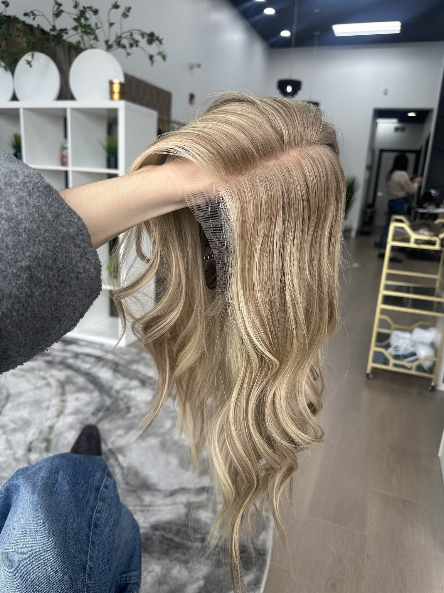 _Curly_honey_blonde_wig_on_a_woman_at_Tresses_By_Juless_Studio__Folsom__California___.jpg