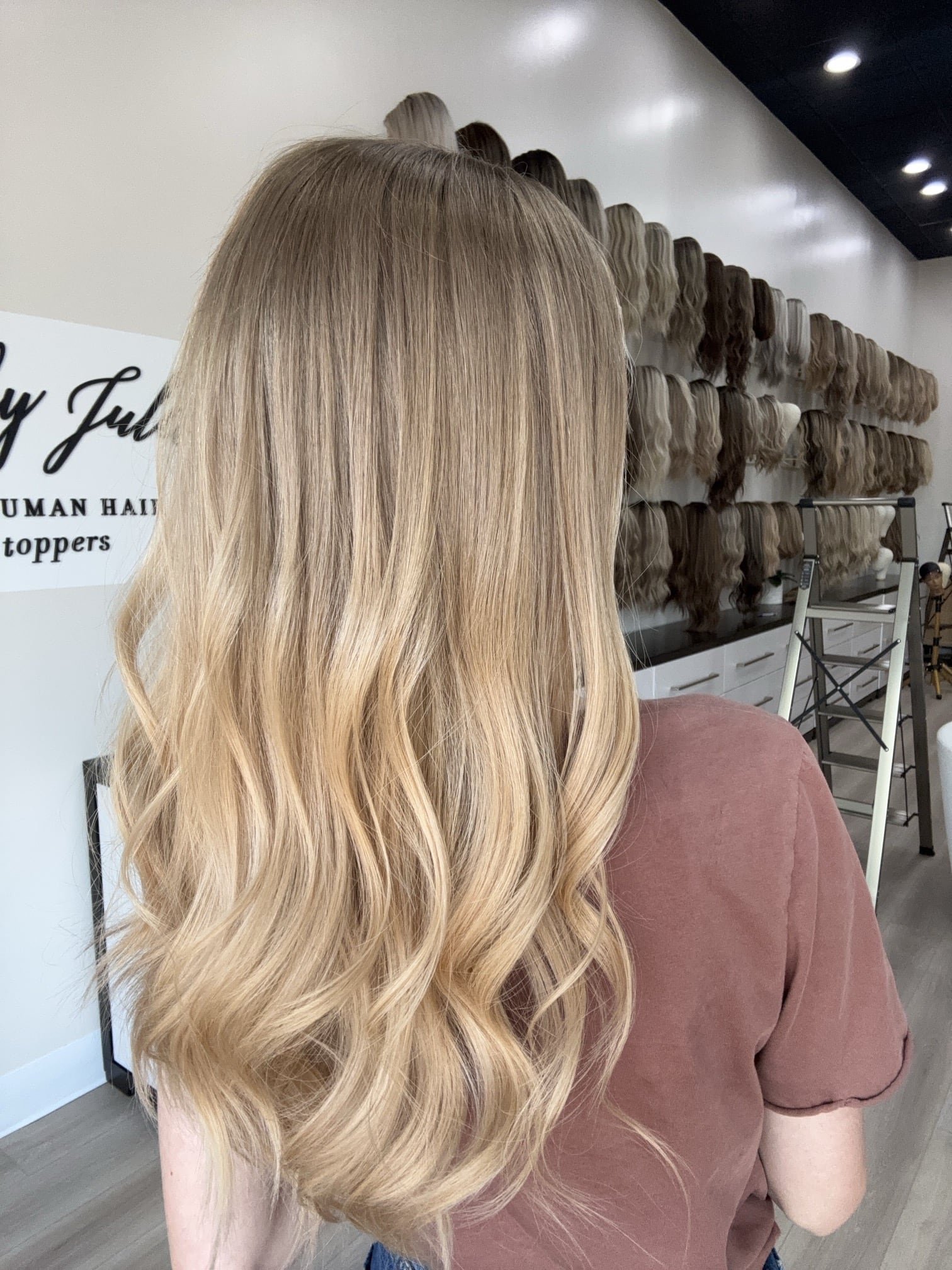 _Woman_wearing_a_jet_black_curly_wig_at_Tresses_By_Juless_Studio__Rancho_Cordova__Folsom___.jpg
