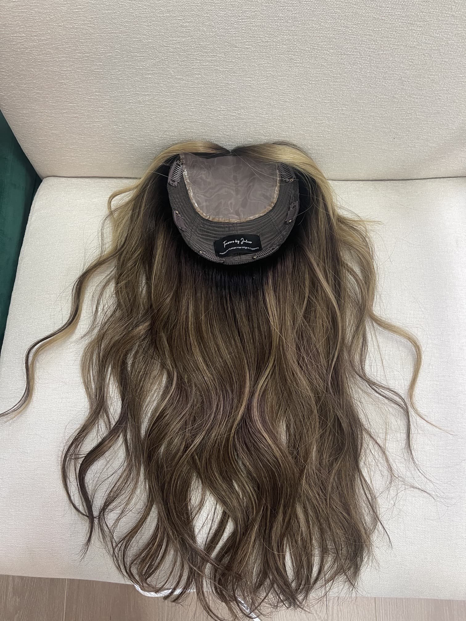 Brunette_human_hair_wig_with_caramel_highlights_worn_by_a_woman_in_Folsom_Studio__.jpg