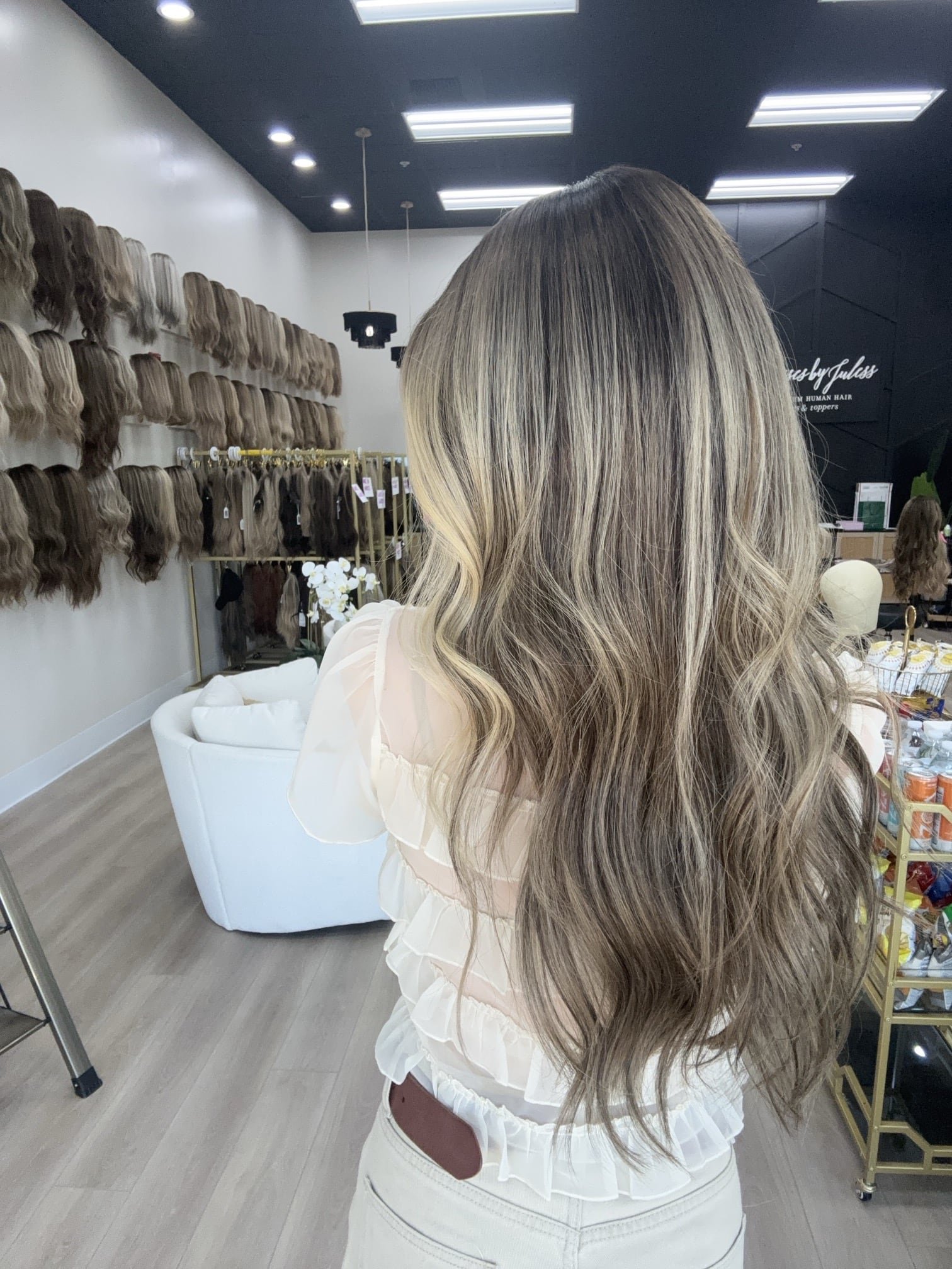 _Woman_wearing_a_jet_black_straight_wig_inside_Tresses_By_Juless_Studio__Davis__Sacramento___.jpg