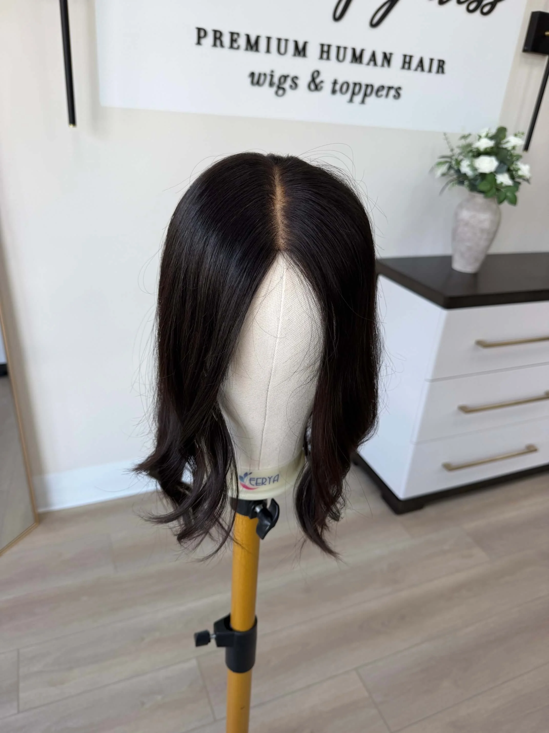 18-inch brown European human hair topper with a Feather Silque base