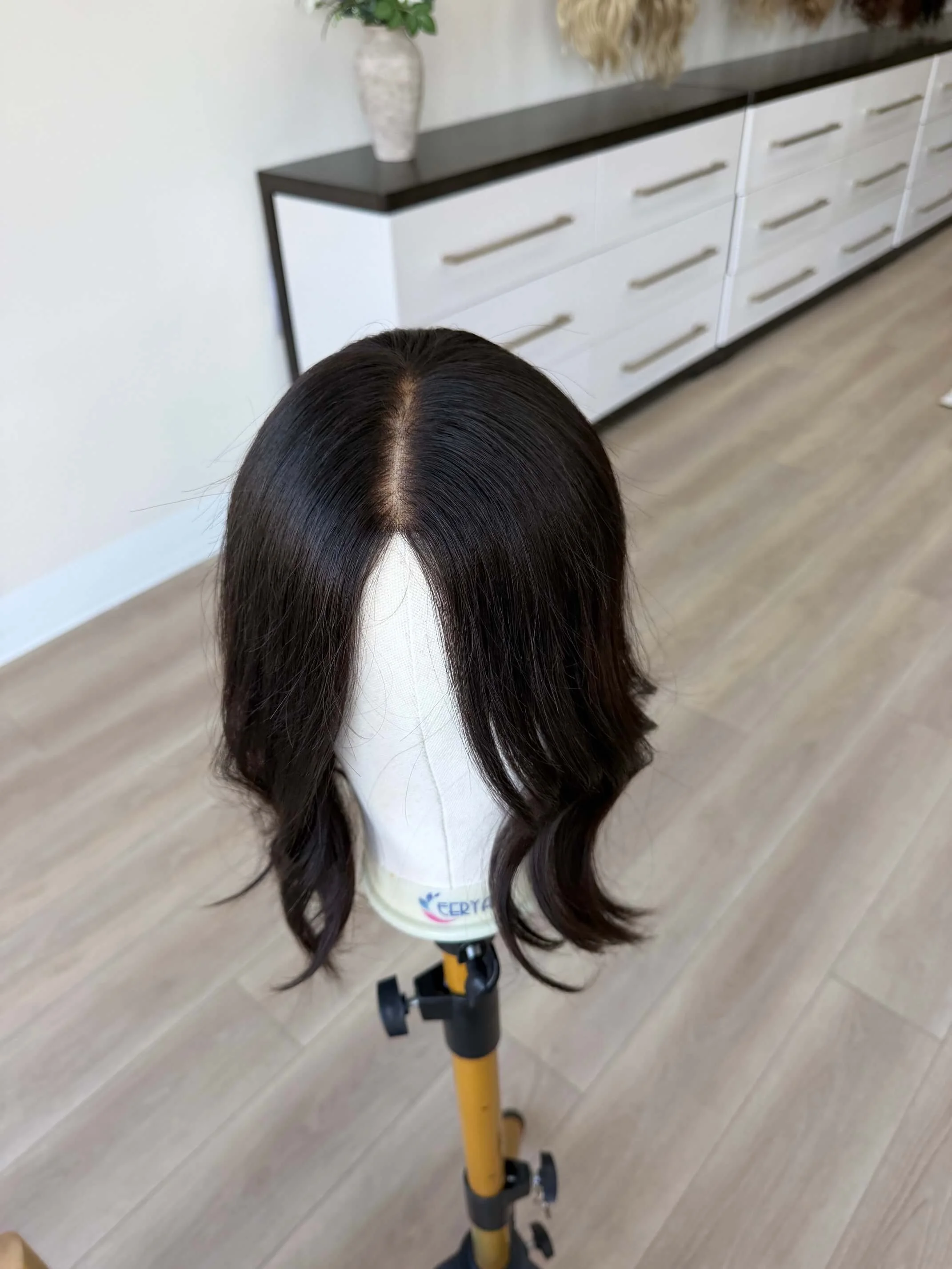 18-inch brown human hair topper with a Velvet Luxe base