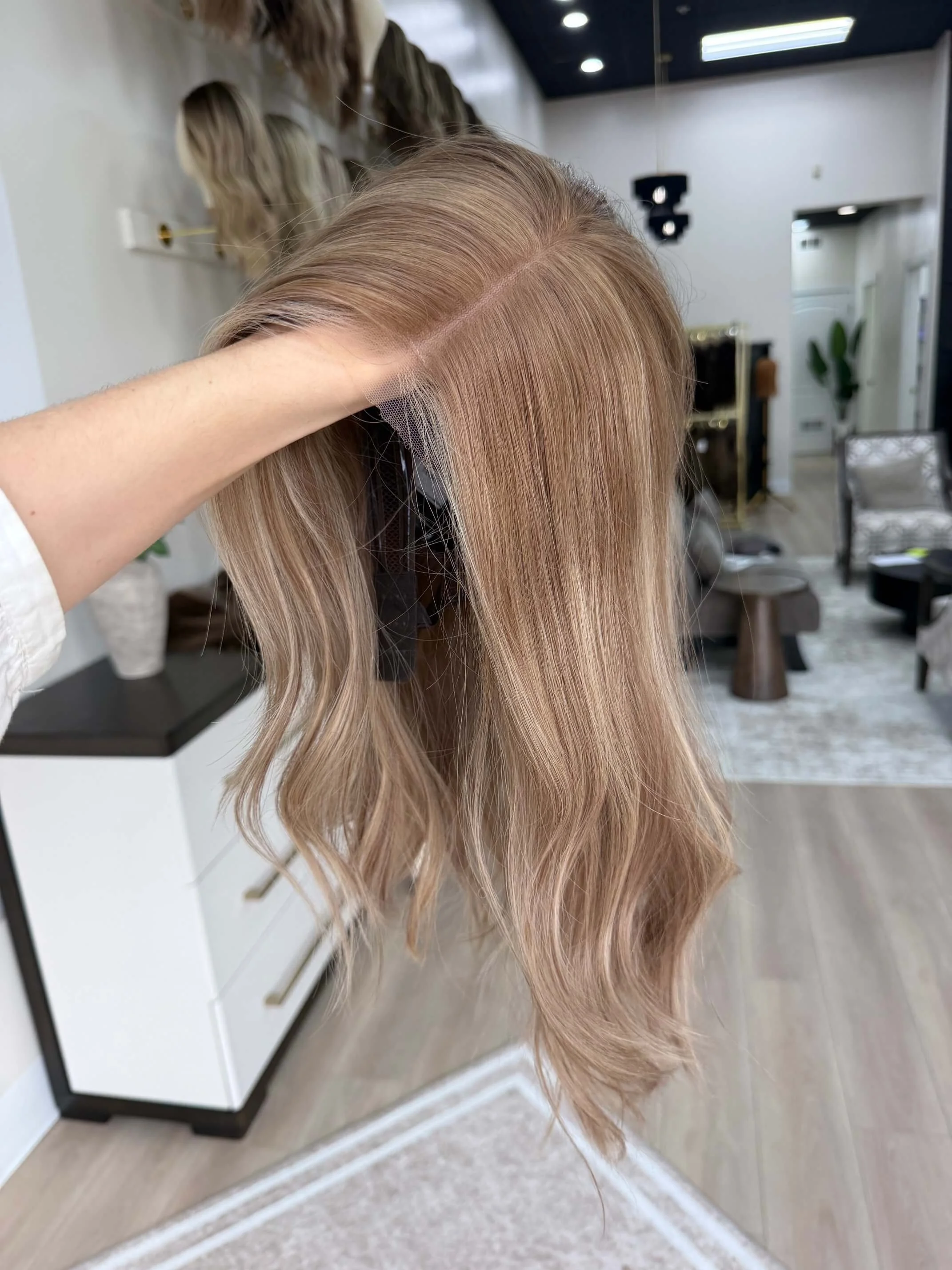20-inch blonde human hair wig with a Velvet Luxe base