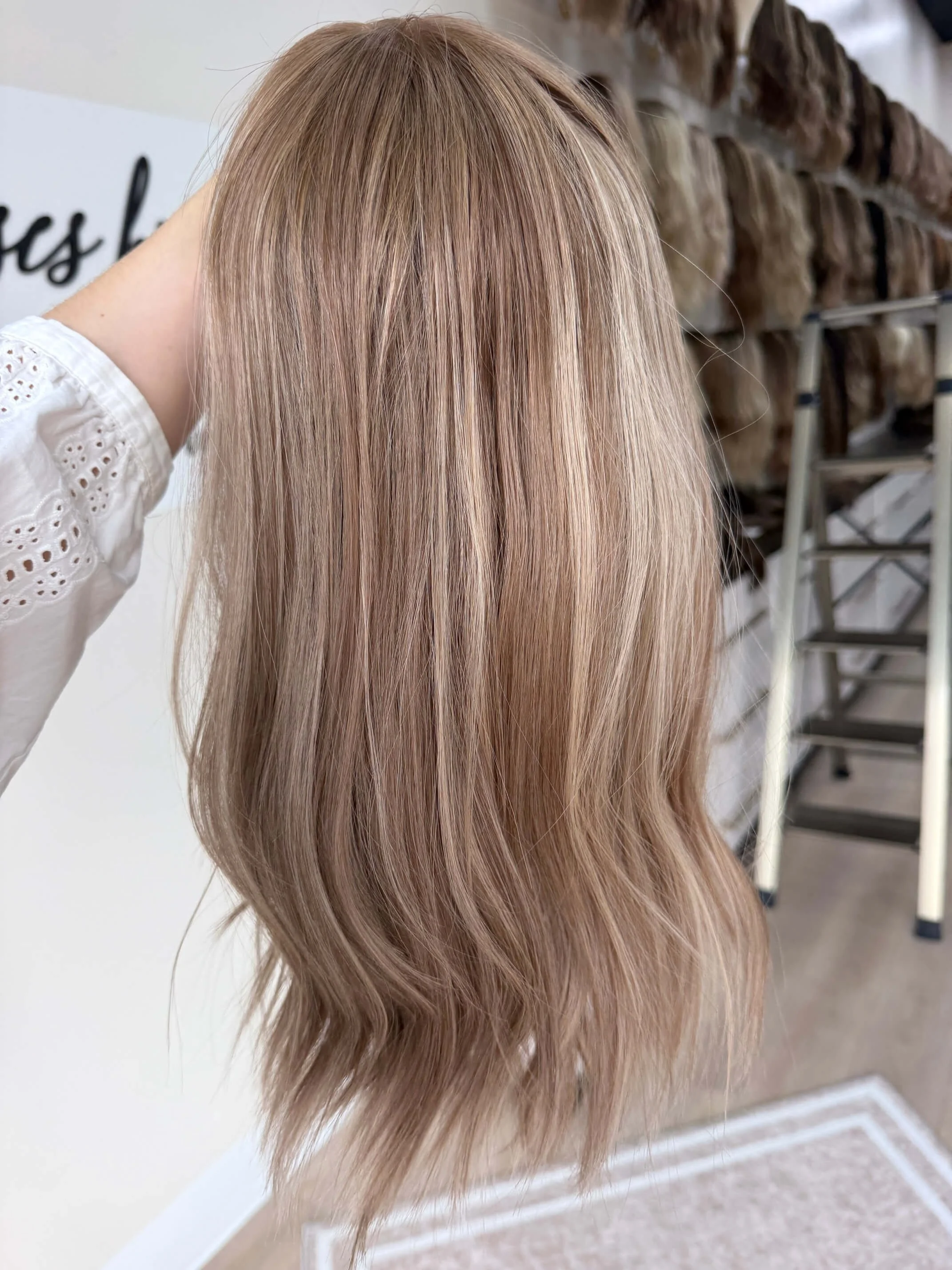 20-inch blonde human hair wig with a Velvet Luxe base