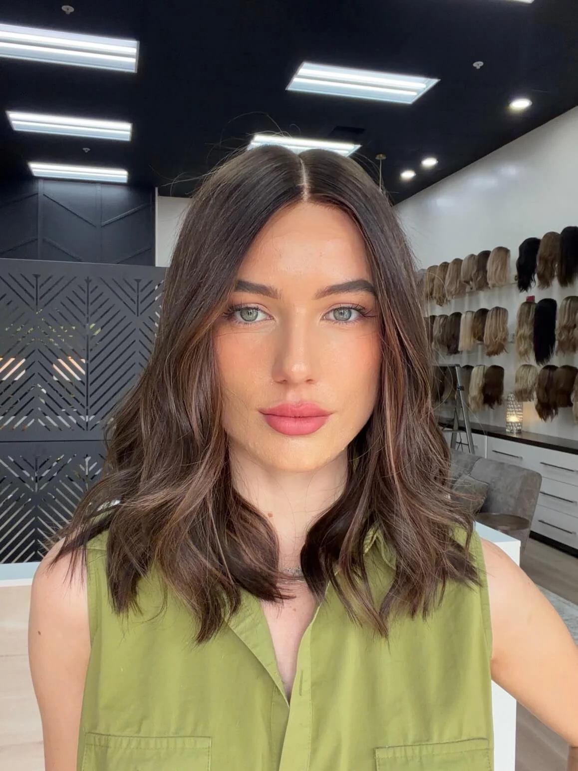 20-inch brown human hair wig with a Feather Silque base