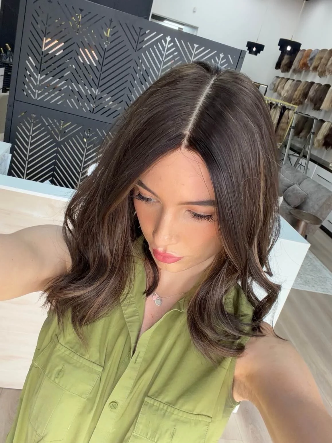 20-inch brown human hair wig with a Feather Silque base