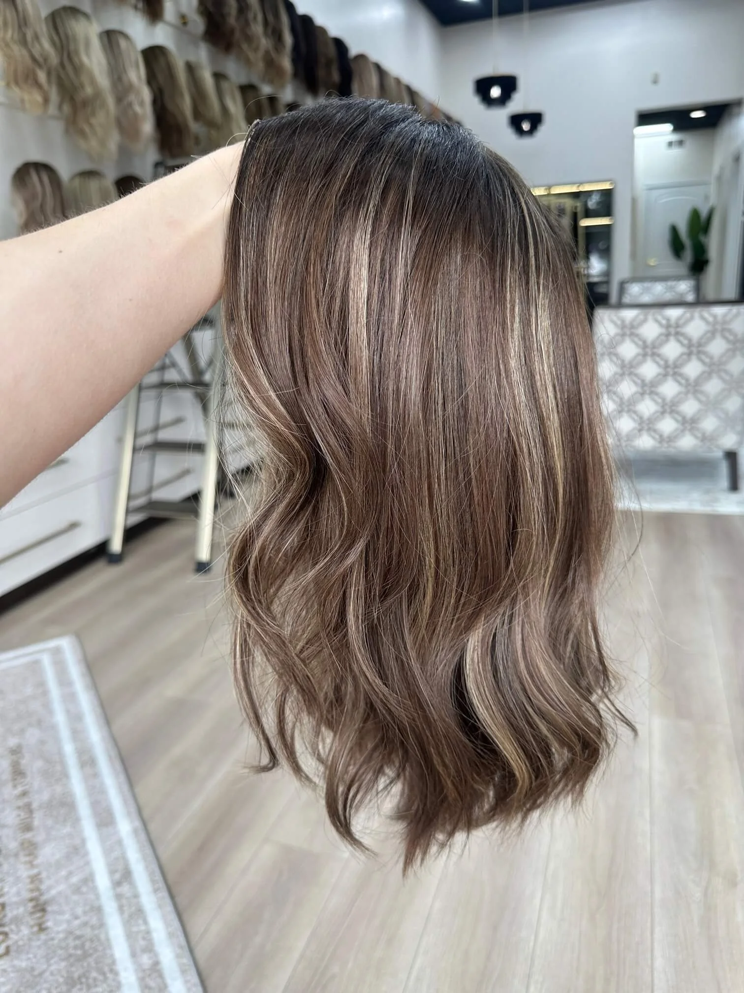 20-inch brown human hair wig with a Velvet Luxe base